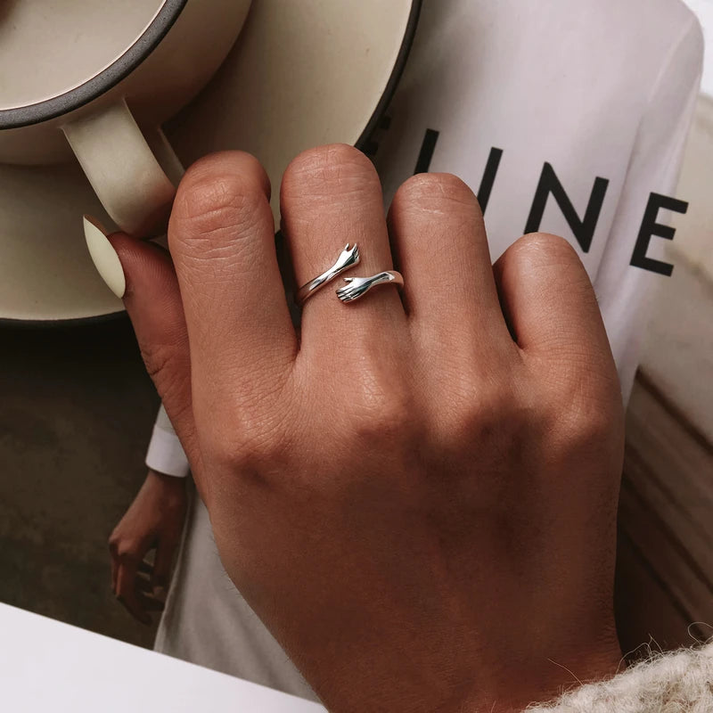 Hugging Hand Ring – A Symbol of Love and Comfort